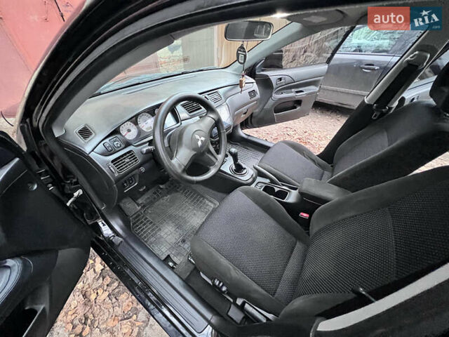 Чорний Міцубісі Lancer, об'ємом двигуна 1.6 л та пробігом 220 тис. км за 5500 $, фото 8 на Automoto.ua