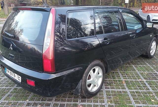 Мицубиси Лансер 2006 в Киеве на Automoto.ua Черный Мицубиси Лансер, объемом двигателя 1.58 л и пробегом 296 тыс. км за 4500 $, фото 23 на Automoto.ua