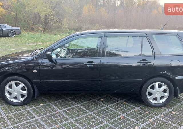 Мицубиси Лансер 2006 в Киеве на Automoto.ua Черный Мицубиси Лансер, объемом двигателя 1.58 л и пробегом 296 тыс. км за 4500 $, фото 11 на Automoto.ua