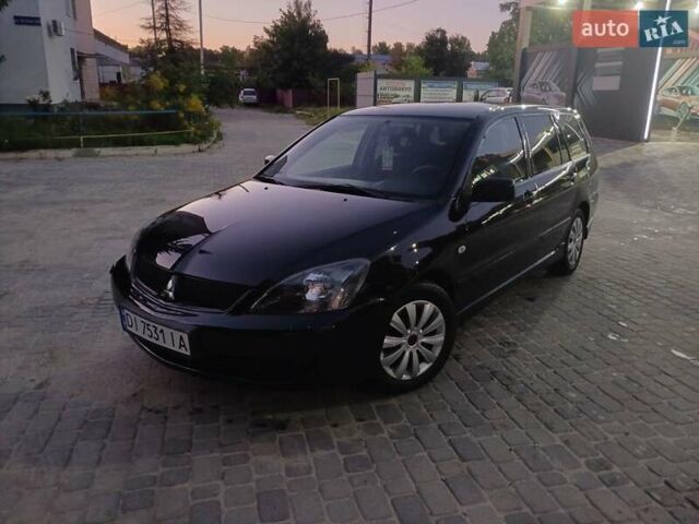 Чорний Міцубісі Lancer, об'ємом двигуна 0 л та пробігом 334 тис. км за 4300 $, фото 36 на Automoto.ua