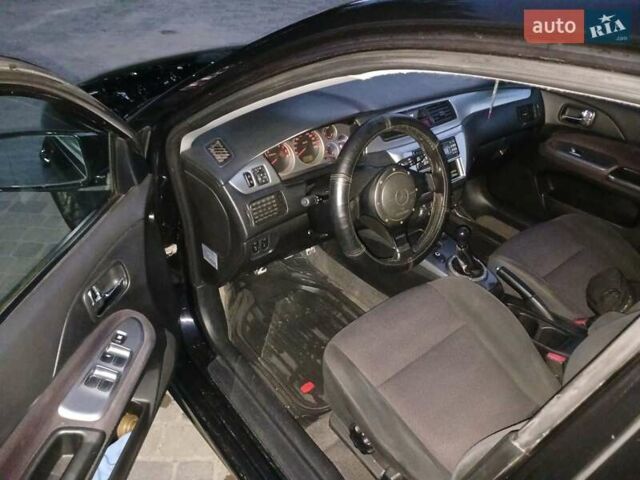 Чорний Міцубісі Lancer, об'ємом двигуна 0 л та пробігом 334 тис. км за 4300 $, фото 15 на Automoto.ua