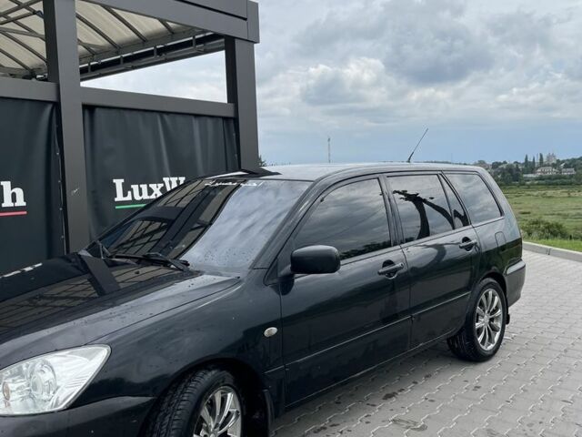 Чорний Міцубісі Lancer, об'ємом двигуна 1.6 л та пробігом 340 тис. км за 3500 $, фото 2 на Automoto.ua