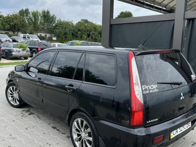 Чорний Міцубісі Lancer, об'ємом двигуна 1.6 л та пробігом 340 тис. км за 3500 $, фото 10 на Automoto.ua