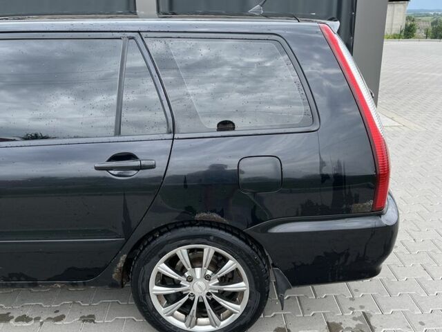 Чорний Міцубісі Lancer, об'ємом двигуна 1.6 л та пробігом 340 тис. км за 3500 $, фото 11 на Automoto.ua