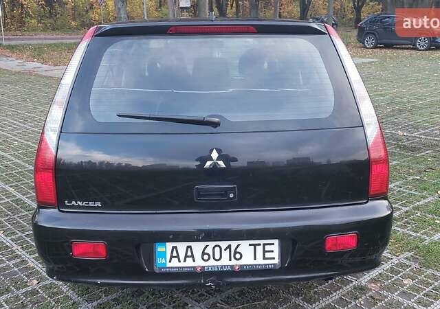 Мицубиси Лансер 2006 в Киеве на Automoto.ua Черный Мицубиси Лансер, объемом двигателя 1.58 л и пробегом 296 тыс. км за 4500 $, фото 14 на Automoto.ua