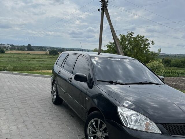 Чорний Міцубісі Lancer, об'ємом двигуна 1.6 л та пробігом 340 тис. км за 3500 $, фото 3 на Automoto.ua