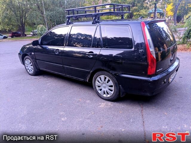 Чорний Міцубісі Lancer, об'ємом двигуна 1.6 л та пробігом 330 тис. км за 2250 $, фото 3 на Automoto.ua