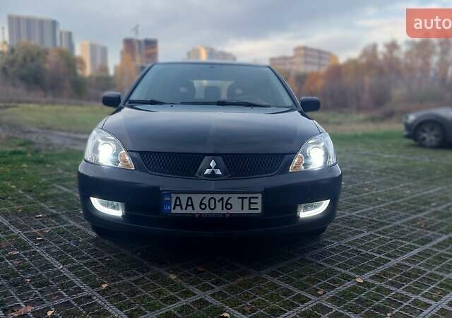 Мицубиси Лансер 2006 в Киеве на Automoto.ua Черный Мицубиси Лансер, объемом двигателя 1.58 л и пробегом 296 тыс. км за 4500 $, фото 8 на Automoto.ua