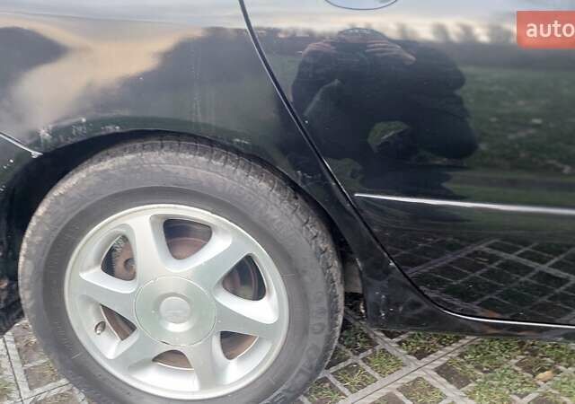 Мицубиси Лансер 2006 в Киеве на Automoto.ua Черный Мицубиси Лансер, объемом двигателя 1.58 л и пробегом 296 тыс. км за 4500 $, фото 26 на Automoto.ua