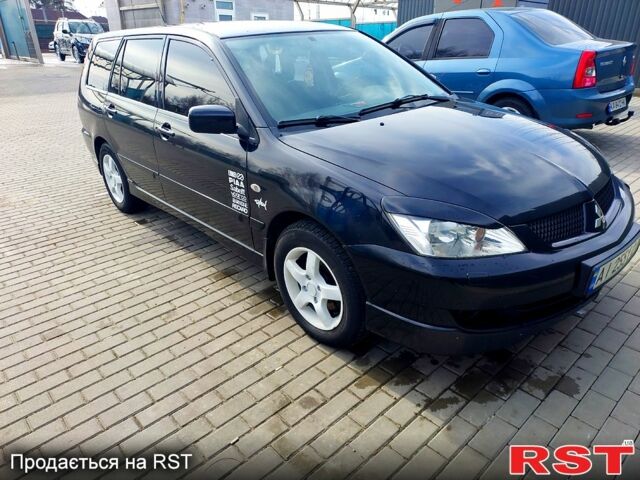 Чорний Міцубісі Lancer, об'ємом двигуна 1.6 л та пробігом 344 тис. км за 4800 $, фото 1 на Automoto.ua