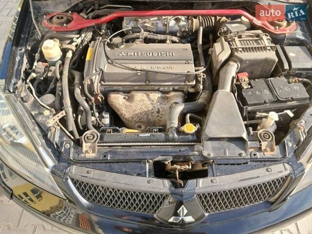 Чорний Міцубісі Lancer, об'ємом двигуна 0 л та пробігом 334 тис. км за 4300 $, фото 33 на Automoto.ua