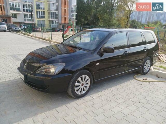 Чорний Міцубісі Lancer, об'ємом двигуна 0 л та пробігом 334 тис. км за 4300 $, фото 35 на Automoto.ua
