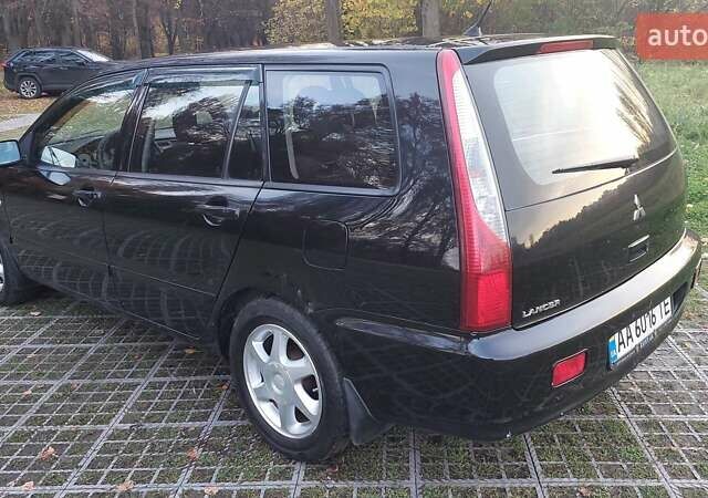 Мицубиси Лансер 2006 в Киеве на Automoto.ua Черный Мицубиси Лансер, объемом двигателя 1.58 л и пробегом 296 тыс. км за 4500 $, фото 24 на Automoto.ua