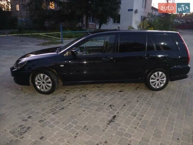 Чорний Міцубісі Lancer, об'ємом двигуна 0 л та пробігом 334 тис. км за 4300 $, фото 38 на Automoto.ua