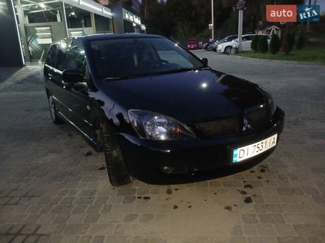 Чорний Міцубісі Lancer, об'ємом двигуна 0 л та пробігом 334 тис. км за 4300 $, фото 44 на Automoto.ua