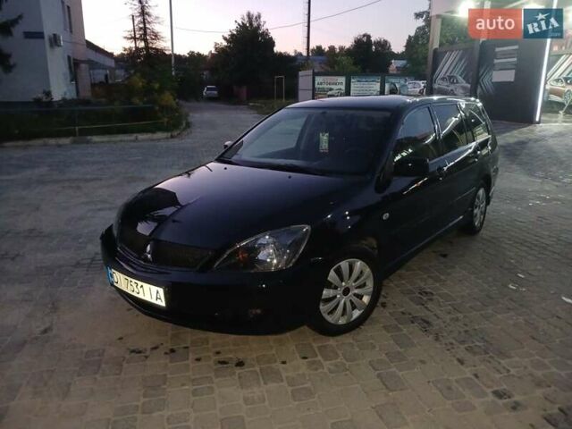 Чорний Міцубісі Lancer, об'ємом двигуна 0 л та пробігом 334 тис. км за 4300 $, фото 5 на Automoto.ua
