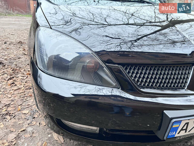 Чорний Міцубісі Lancer, об'ємом двигуна 1.6 л та пробігом 220 тис. км за 5500 $, фото 3 на Automoto.ua