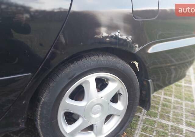 Мицубиси Лансер 2006 в Киеве на Automoto.ua Черный Мицубиси Лансер, объемом двигателя 1.58 л и пробегом 296 тыс. км за 4500 $, фото 25 на Automoto.ua