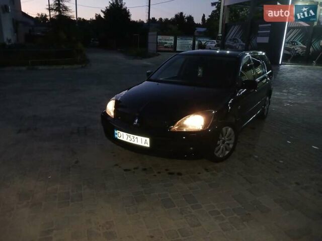 Чорний Міцубісі Lancer, об'ємом двигуна 0 л та пробігом 334 тис. км за 4300 $, фото 47 на Automoto.ua