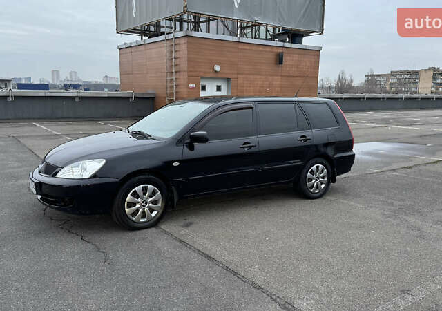 Чорний Міцубісі Lancer, об'ємом двигуна 1.58 л та пробігом 260 тис. км за 3299 $, фото 3 на Automoto.ua