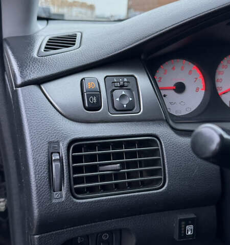 Чорний Міцубісі Lancer, об'ємом двигуна 1.58 л та пробігом 260 тис. км за 3299 $, фото 24 на Automoto.ua