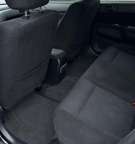 Чорний Міцубісі Lancer, об'ємом двигуна 1.58 л та пробігом 260 тис. км за 3299 $, фото 18 на Automoto.ua