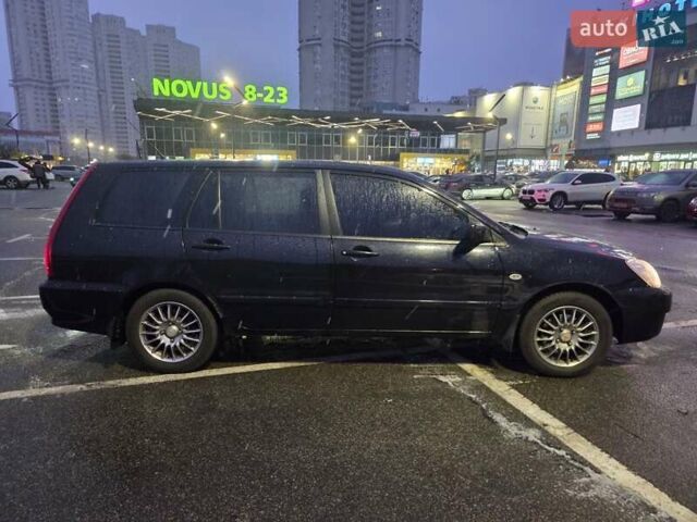 Чорний Міцубісі Lancer, об'ємом двигуна 1.6 л та пробігом 180 тис. км за 4100 $, фото 4 на Automoto.ua