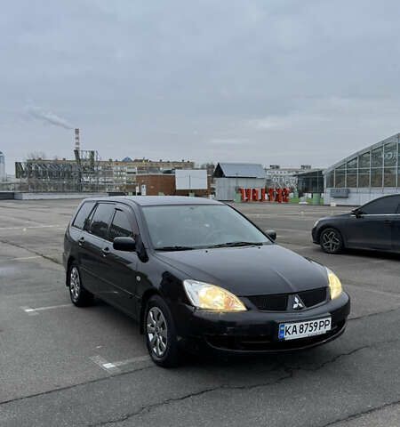 Чорний Міцубісі Lancer, об'ємом двигуна 1.58 л та пробігом 260 тис. км за 3299 $, фото 1 на Automoto.ua