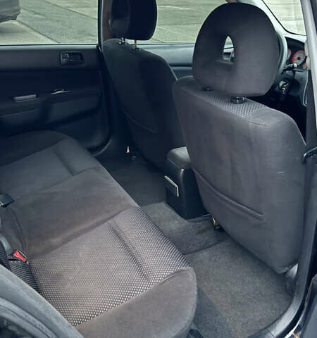 Чорний Міцубісі Lancer, об'ємом двигуна 1.58 л та пробігом 260 тис. км за 3299 $, фото 33 на Automoto.ua