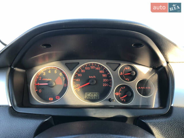 Чорний Міцубісі Lancer, об'ємом двигуна 1.58 л та пробігом 206 тис. км за 2900 $, фото 3 на Automoto.ua