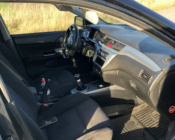Чорний Міцубісі Lancer, об'ємом двигуна 1.58 л та пробігом 206 тис. км за 2900 $, фото 8 на Automoto.ua
