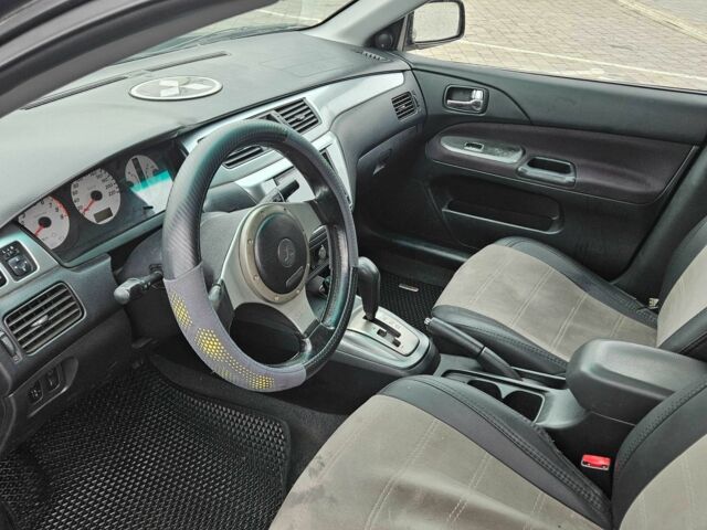 Міцубісі Lancer 2007 у Горішні Плавні (Комсомольськ) на Automoto.ua Чорний Міцубісі Lancer, об'ємом двигуна 2 л та пробігом 237 тис. км за 4300 $, фото 4 на Automoto.ua