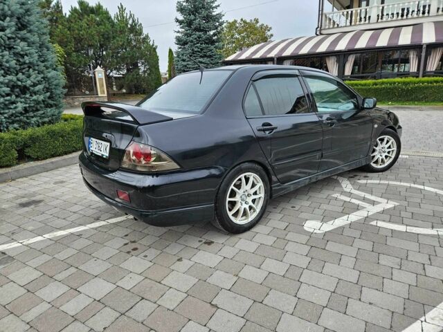 Міцубісі Lancer 2007 у Горішні Плавні (Комсомольськ) на Automoto.ua Чорний Міцубісі Lancer, об'ємом двигуна 2 л та пробігом 237 тис. км за 4300 $, фото 2 на Automoto.ua