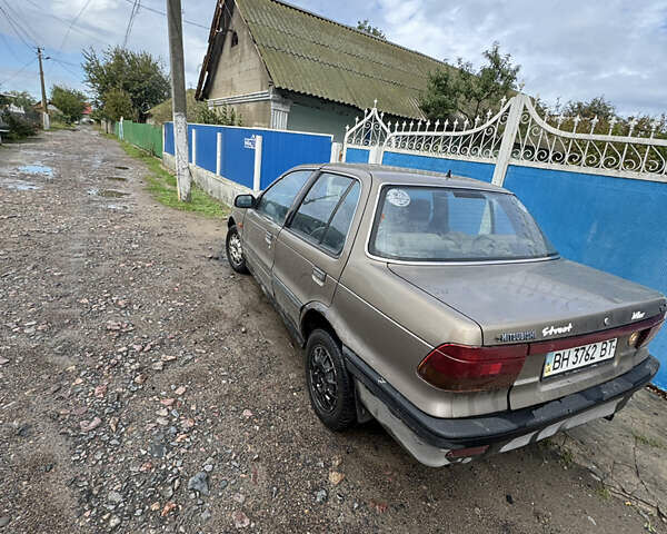 Коричневый Мицубиси Лансер, объемом двигателя 1.5 л и пробегом 320 тыс. км за 700 $, фото 3 на Automoto.ua