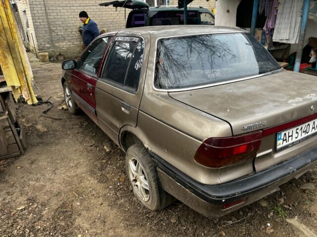 Коричневий Міцубісі Lancer, об'ємом двигуна 1.8 л та пробігом 200 тис. км за 1136 $, фото 3 на Automoto.ua