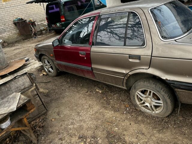 Коричневий Міцубісі Lancer, об'ємом двигуна 1.8 л та пробігом 200 тис. км за 1136 $, фото 4 на Automoto.ua