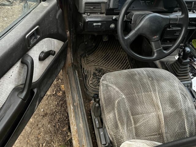 Коричневий Міцубісі Lancer, об'ємом двигуна 1.8 л та пробігом 200 тис. км за 1136 $, фото 6 на Automoto.ua