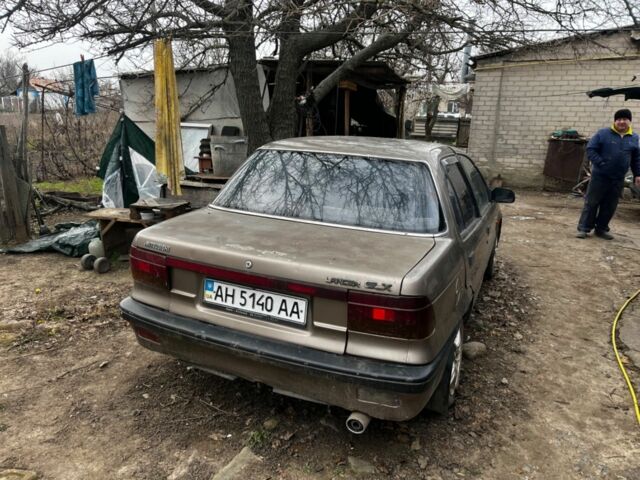 Коричневий Міцубісі Lancer, об'ємом двигуна 1.8 л та пробігом 200 тис. км за 1136 $, фото 2 на Automoto.ua