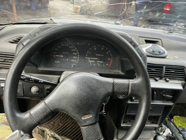 Коричневий Міцубісі Lancer, об'ємом двигуна 1.8 л та пробігом 200 тис. км за 1136 $, фото 5 на Automoto.ua