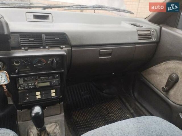 Коричневий Міцубісі Lancer, об'ємом двигуна 1.5 л та пробігом 200 тис. км за 700 $, фото 3 на Automoto.ua