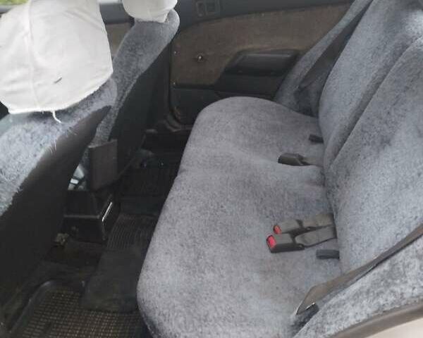 Коричневий Міцубісі Lancer, об'ємом двигуна 1.5 л та пробігом 200 тис. км за 700 $, фото 6 на Automoto.ua