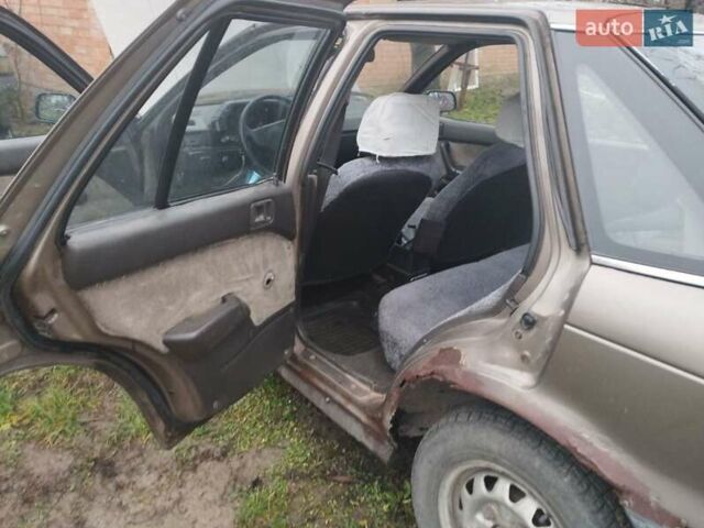 Коричневий Міцубісі Lancer, об'ємом двигуна 1.5 л та пробігом 200 тис. км за 700 $, фото 1 на Automoto.ua