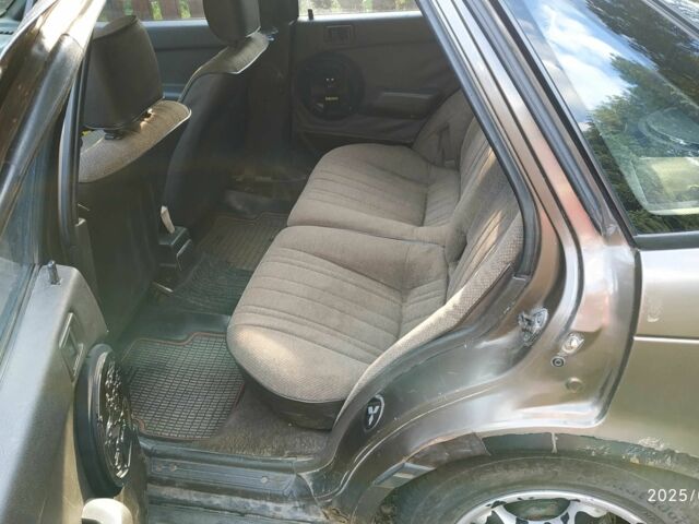 Коричневий Міцубісі Lancer, об'ємом двигуна 1.5 л та пробігом 608 тис. км за 900 $, фото 7 на Automoto.ua