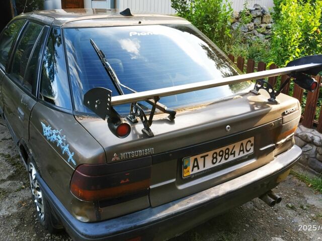 Коричневий Міцубісі Lancer, об'ємом двигуна 1.5 л та пробігом 608 тис. км за 900 $, фото 4 на Automoto.ua