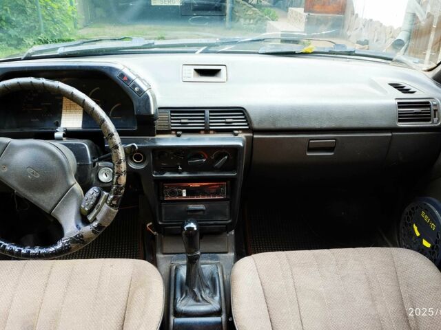 Коричневий Міцубісі Lancer, об'ємом двигуна 1.5 л та пробігом 608 тис. км за 900 $, фото 8 на Automoto.ua