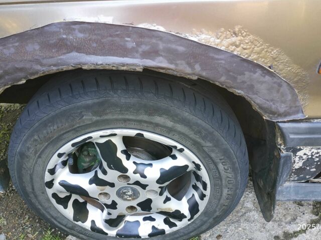 Коричневий Міцубісі Lancer, об'ємом двигуна 1.5 л та пробігом 608 тис. км за 900 $, фото 10 на Automoto.ua