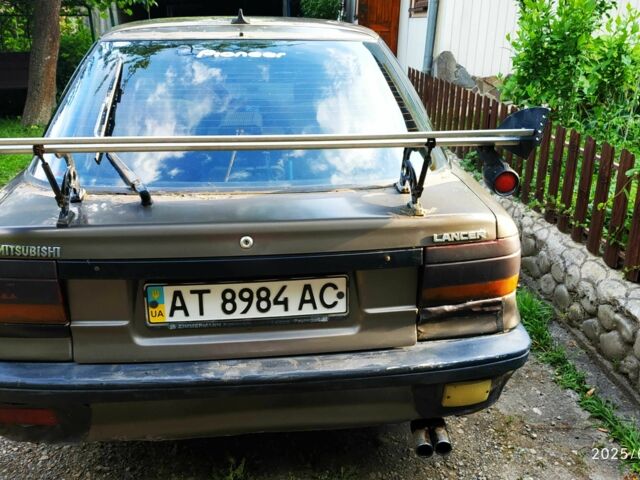 Коричневий Міцубісі Lancer, об'ємом двигуна 1.5 л та пробігом 608 тис. км за 900 $, фото 5 на Automoto.ua