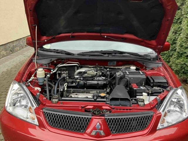 Червоний Міцубісі Lancer, об'ємом двигуна 1.6 л та пробігом 55 тис. км за 5750 $, фото 4 на Automoto.ua