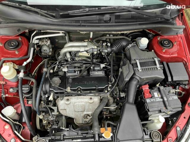 Червоний Міцубісі Lancer, об'ємом двигуна 1.6 л та пробігом 55 тис. км за 5750 $, фото 3 на Automoto.ua
