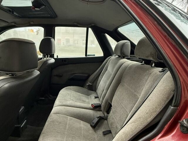 Красный Мицубиси Лансер, объемом двигателя 1.5 л и пробегом 270 тыс. км за 950 $, фото 7 на Automoto.ua